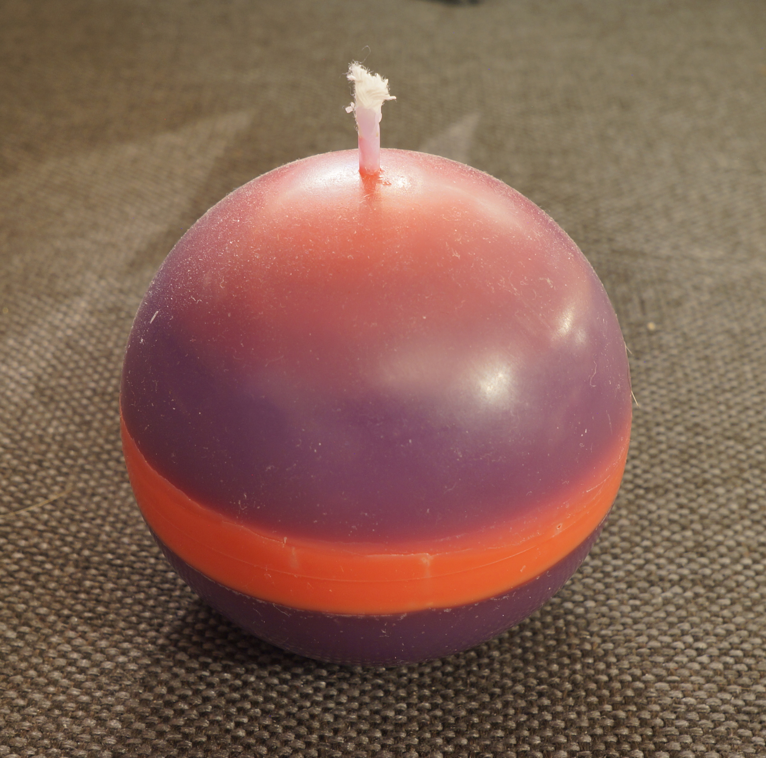 Homecast and violet and pink candle